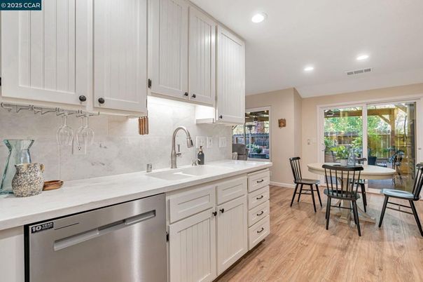 Dining room, Interior, Kitchen, Recessed Lighting, Stainless Steel Appliances, Wood Texture Flooring