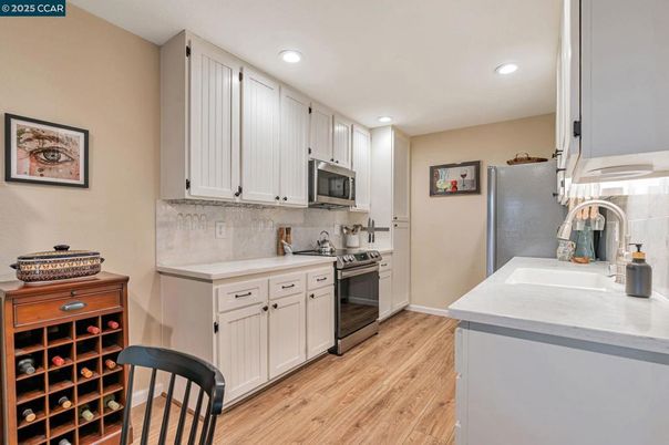 Interior, Kitchen, Recessed Lighting, Stainless Steel Appliances, Wood Texture Flooring
