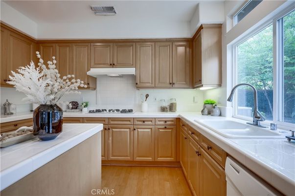 Interior, Kitchen, Tile Countertops, Wood Texture Flooring