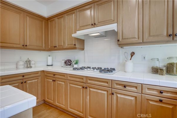Interior, Kitchen, Tile Countertops, Wood Texture Flooring