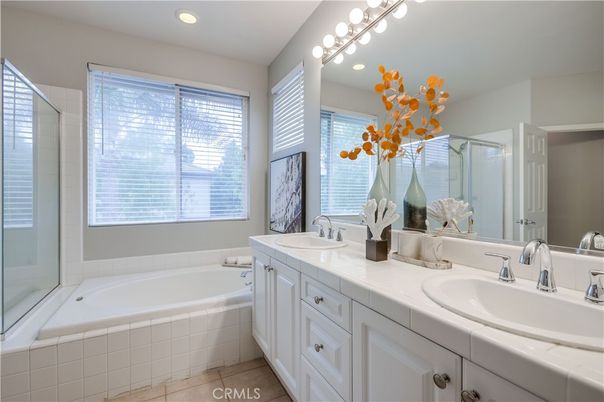 Bathroom, Dual Sink Vanities, Glass Shower, Interior, Recessed Lighting, Tile Countertops