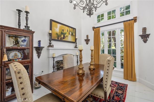 Chandelier, Dining room, Fireplace, Interior, Marble