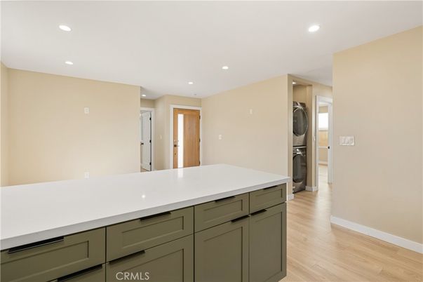 Interior, Kitchen, Recessed Lighting, Utility Closets, Washer, Wood Texture Flooring