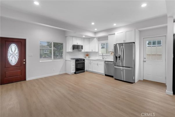 Interior, Kitchen, Recessed Lighting, Stainless Steel Appliances, Wood Texture Flooring