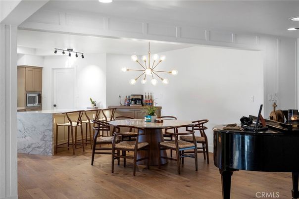 Dining room, Interior, Pendant Lights, Piano, Recessed Lighting, Wood Texture Flooring