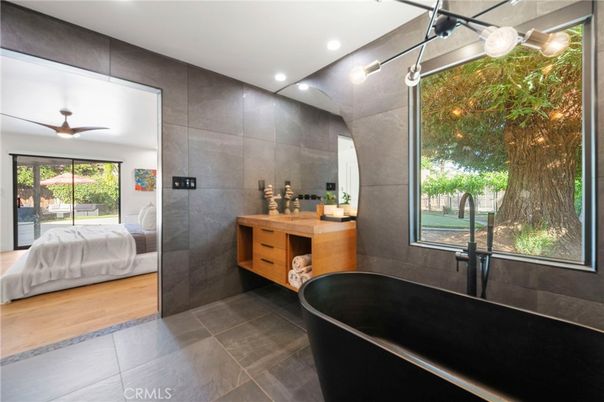 Bathroom, Bedroom, Dual Sink Vanities, Free Standing Baths, Interior, Recessed Lighting, Wood Texture Flooring