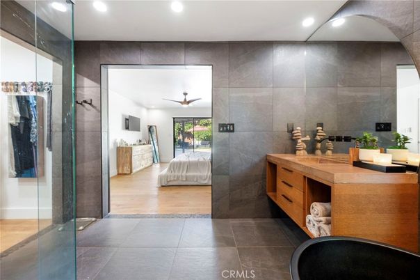 Bathroom, Bedroom, Dual Sink Vanities, Glass Shower, Interior, Recessed Lighting, Wood Texture Flooring