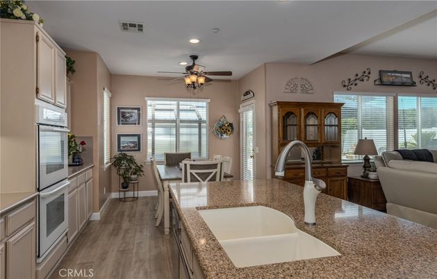 Dining room, Interior, Kitchen, Recessed Lighting, Stainless Steel Appliances, Wood Texture Flooring
