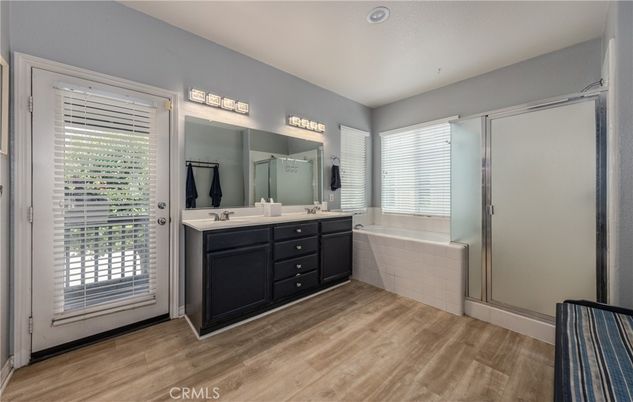 Bathroom, Dual Sink Vanities, Interior, Recessed Lighting, Wood Texture Flooring