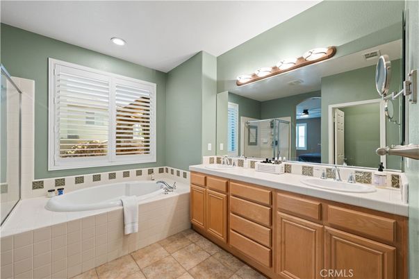 Bathroom, Dual Sink Vanities, Interior, Recessed Lighting, Tile Countertops