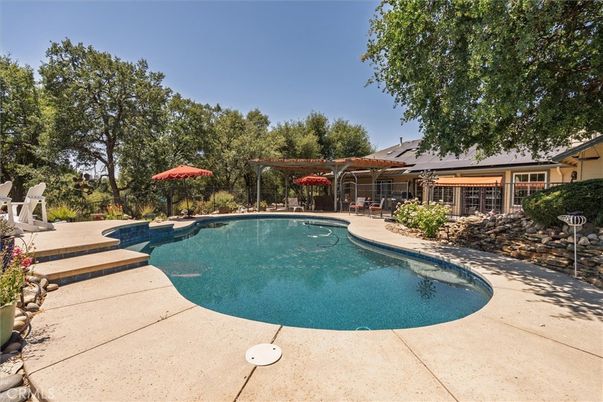Exterior, Pool, Solar Panels
