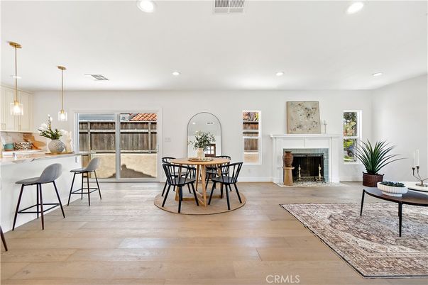 Dining room, Fireplace, Interior, Pendant Lights, Recessed Lighting, Wood Texture Flooring