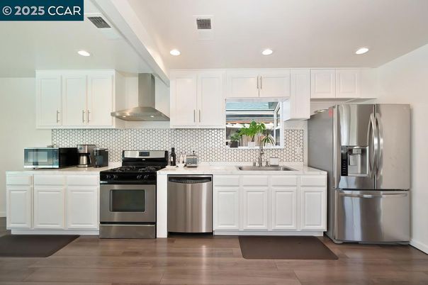 Interior, Kitchen, Recessed Lighting, Stainless Steel Appliances, Wood Texture Flooring