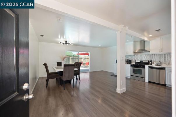 Dining room, Interior, Kitchen, Recessed Lighting, Stainless Steel Appliances, Wood Texture Flooring