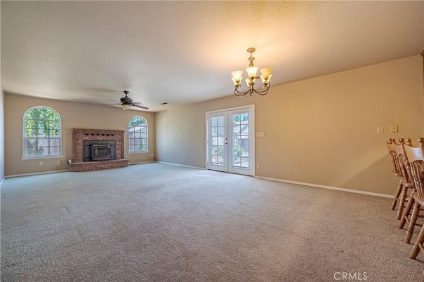 Chandelier, Empty room, Fireplace, Interior