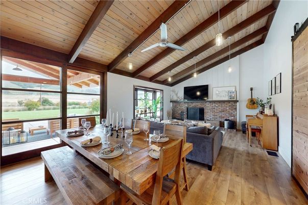 Dining room, Fireplace, Interior, Living room, Pendant Lights, Stone Walls, Wooden Beams, Wooden Ceilings, Wood Texture Flooring