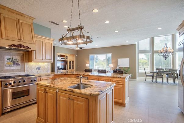 Chandelier, Dining room, Interior, Kitchen, Pendant Lights, Recessed Lighting, Stainless Steel Appliances