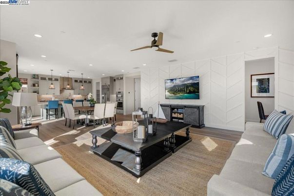 Dining room, Fireplace, Interior, Kitchen, Living room, Pendant Lights, Recessed Lighting, Stainless Steel Appliances, Wood Texture Flooring