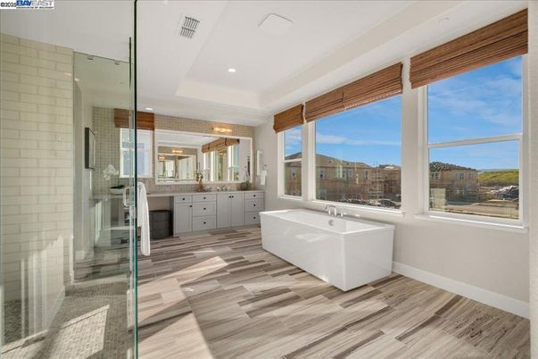 Bathroom, Free Standing Baths, Glass Shower, Interior, Recessed Lighting, Wood Texture Flooring
