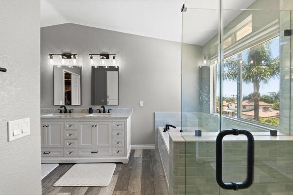 Bathroom, Dual Sink Vanities, Glass Shower, Interior, Wood Texture Flooring