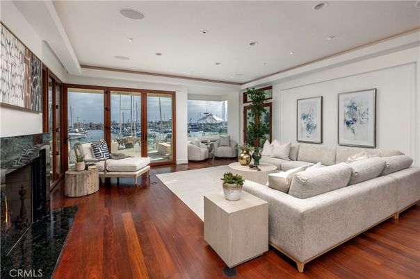 Fireplace, Interior, Living room, Recessed Lighting, Water, Wood Texture Flooring