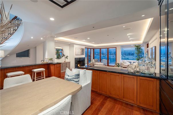 Dining room, Fireplace, Interior, Living room, Recessed Lighting, Wood Texture Flooring