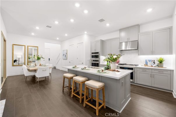 Dining room, Interior, Kitchen, Recessed Lighting, Stainless Steel Appliances, Wood Texture Flooring