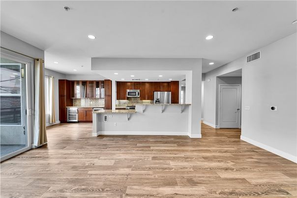 Interior, Kitchen, Recessed Lighting, Stainless Steel Appliances, Wood Texture Flooring