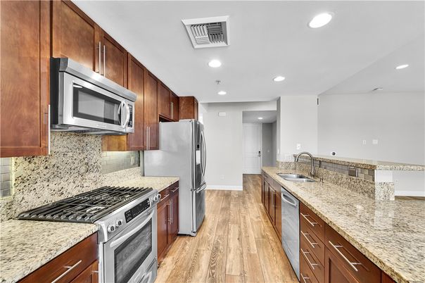 Interior, Kitchen, Recessed Lighting, Stainless Steel Appliances, Wood Texture Flooring