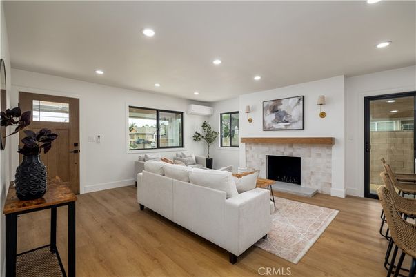 Fireplace, Interior, Living room, Recessed Lighting, Wood Texture Flooring