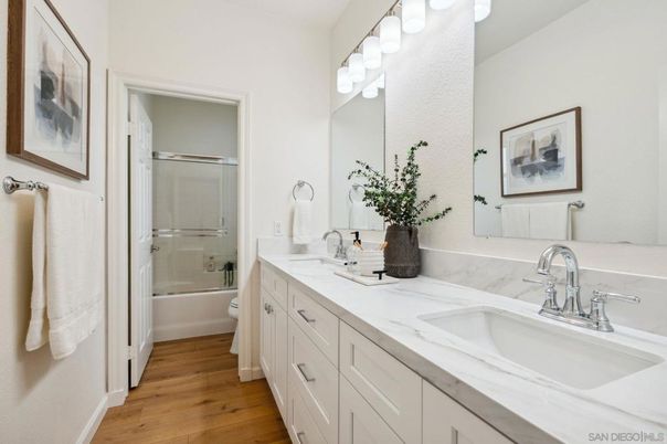 Bathroom, Dual Sink Vanities, Glass Shower, Interior, Wood Texture Flooring