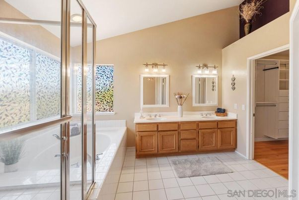 Bathroom, Dual Sink Vanities, Glass Shower, Interior, Wood Texture Flooring