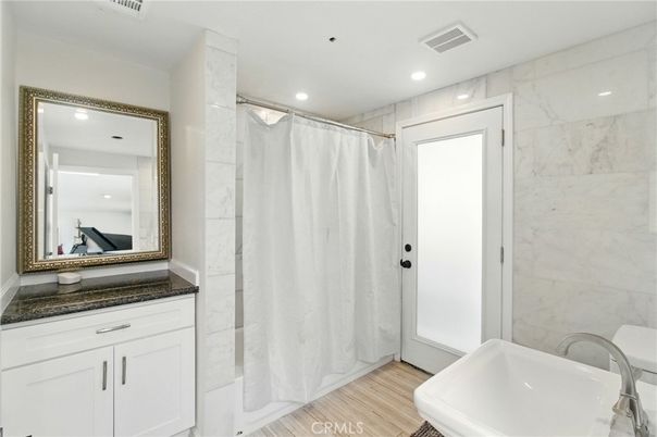 Bathroom, Interior, Marble Walls, Recessed Lighting, Wood Texture Flooring