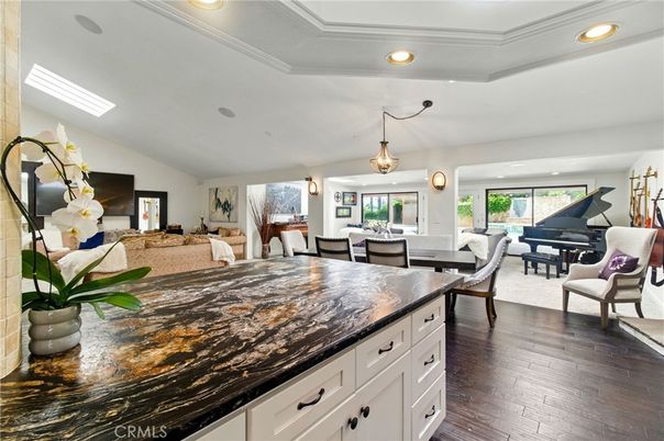 Dining room, Interior, Living room, Pendant Lights, Piano, Recessed Lighting, Wood Texture Flooring