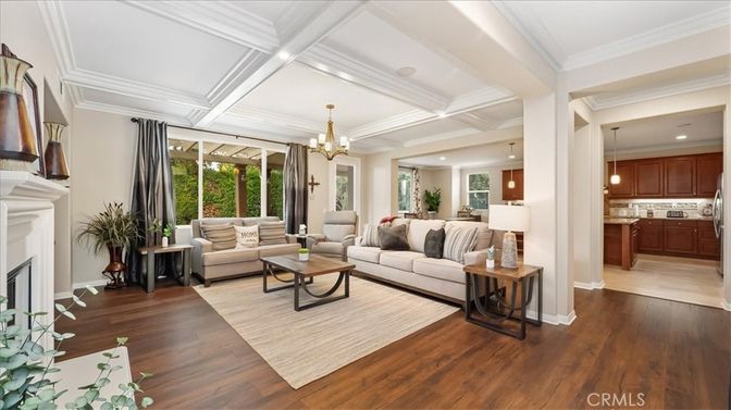 Chandelier, Fireplace, Interior, Living room, Pendant Lights, Recessed Lighting, Wood Texture Flooring