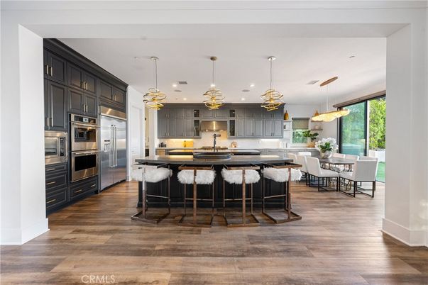 Dining room, Interior, Kitchen, Pendant Lights, Recessed Lighting, Stainless Steel Appliances, Wood Texture Flooring