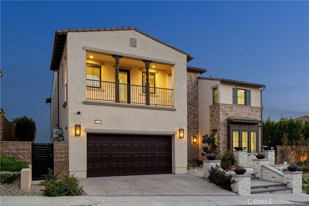 Attached, Exterior, Facade, Brick Facade, Mediterranean