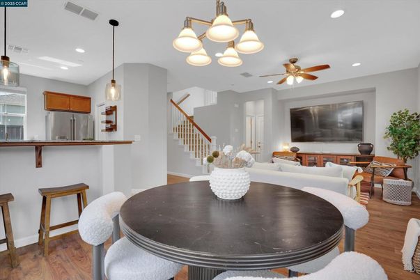 Dining room, Interior, Kitchen, Living room, Pendant Lights, Recessed Lighting, Stainless Steel Appliances, Wood Texture Flooring