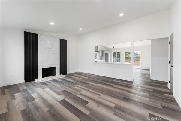 Empty room, Fireplace, Interior, Recessed Lighting, Wood Texture Flooring