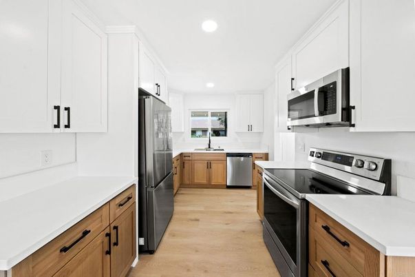 Interior, Kitchen, Recessed Lighting, Stainless Steel Appliances, Wood Texture Flooring