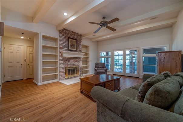 Fireplace, Interior, Living room, Recessed Lighting, Stone Walls, Wood Texture Flooring