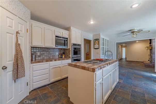 Interior, Kitchen, Recessed Lighting, Tile Countertops