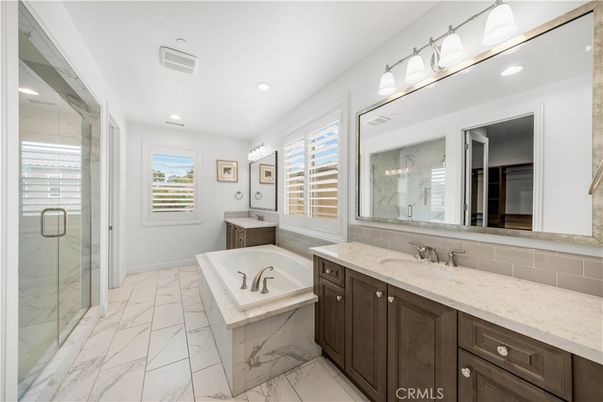 Bathroom, Dual Sink Vanities, Glass Shower, Interior, Marble, Recessed Lighting