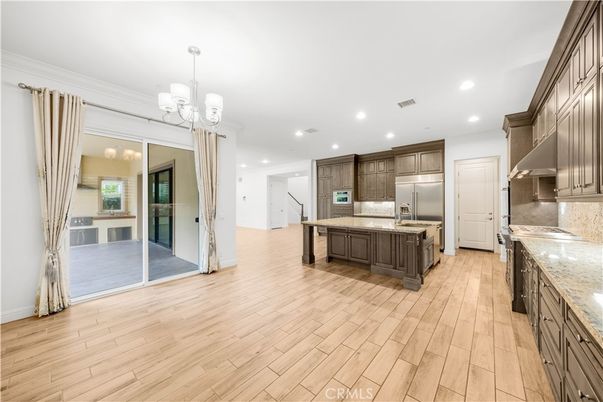 Chandelier, Interior, Kitchen, Recessed Lighting, Stainless Steel Appliances, Wood Texture Flooring