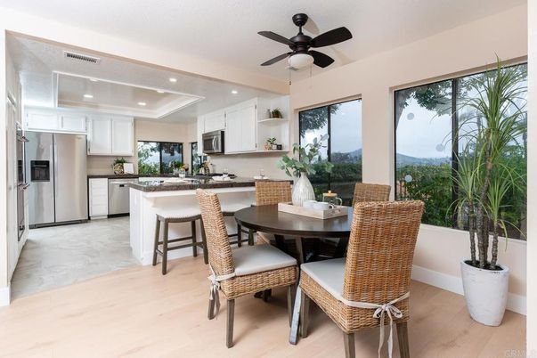 Dining room, Interior, Kitchen, Marble, Recessed Lighting, Stainless Steel Appliances, Wood Texture Flooring