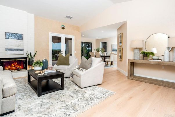 Dining room, Fireplace, Interior, Living room, Recessed Lighting, Wood Texture Flooring