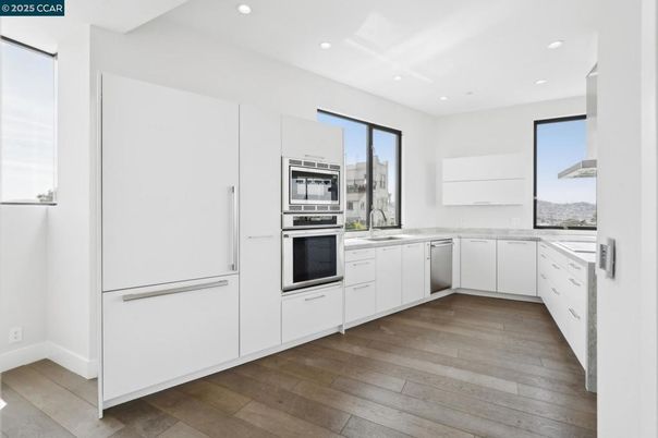 Interior, Kitchen, Recessed Lighting, Stainless Steel Appliances, Wood Texture Flooring
