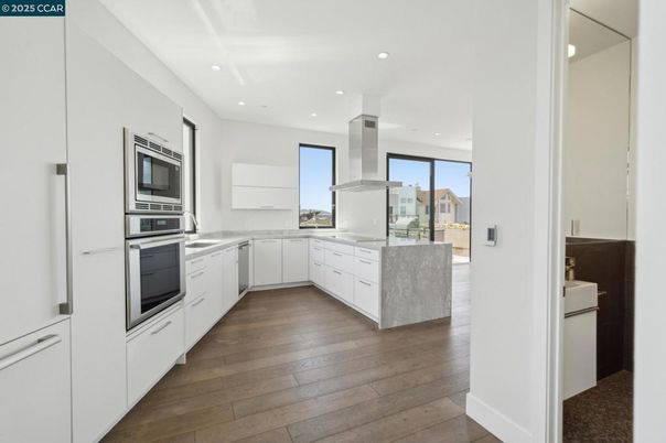 Interior, Kitchen, Recessed Lighting, Stainless Steel Appliances, Wood Texture Flooring
