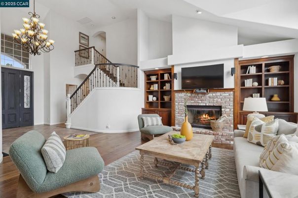 Chandelier, Fireplace, Interior, Living room, Recessed Lighting, Wood Texture Flooring
