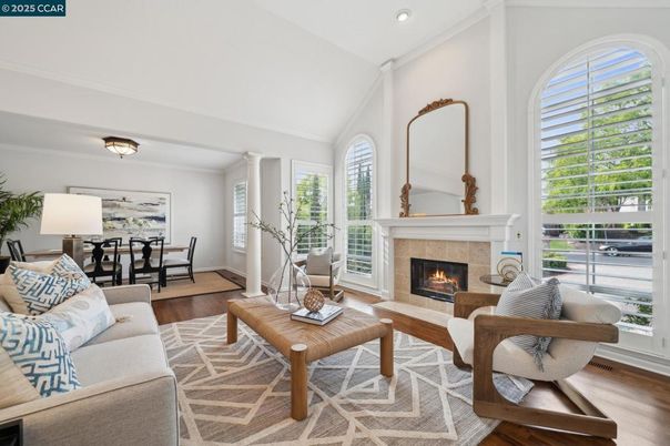 Dining room, Fireplace, Interior, Living room, Recessed Lighting, Wood Texture Flooring